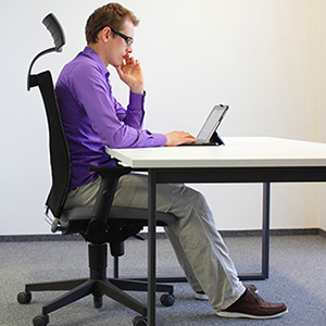 Man Sitting at Desk